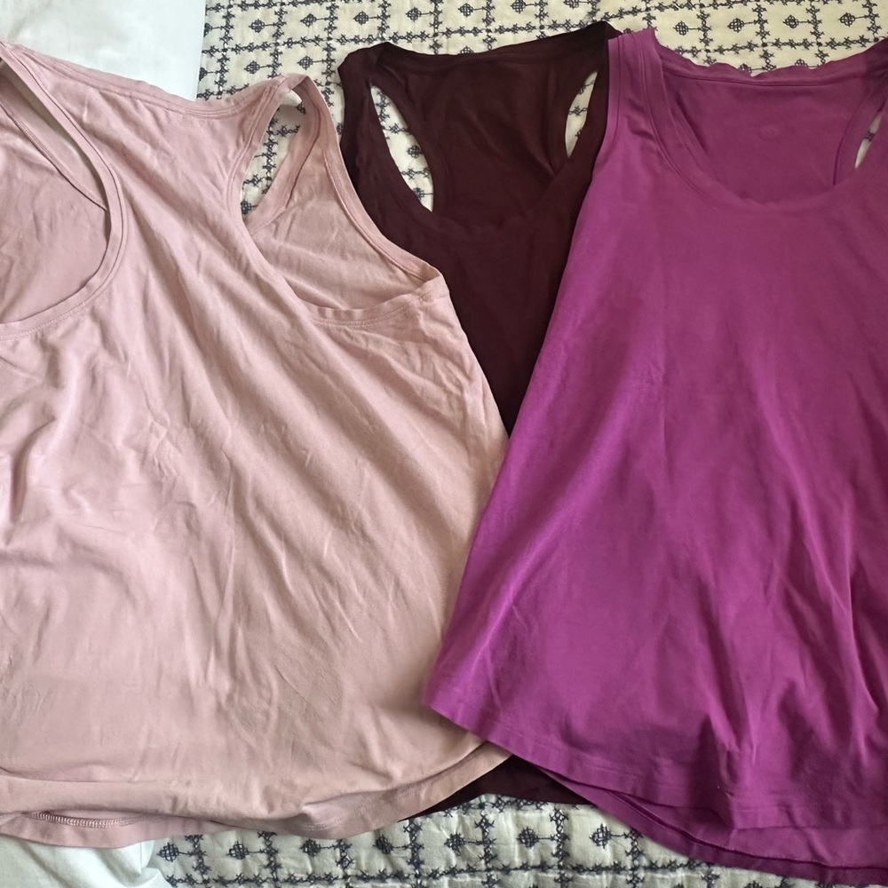 Lot of 3 LuLulemon Racerback Sleeveless Tops - Pink, Purple, and Maroon